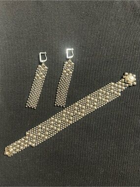 Sergio Gutierrez Liquid Metal Snap Bracelet W/ Matching Dangle Earrings.